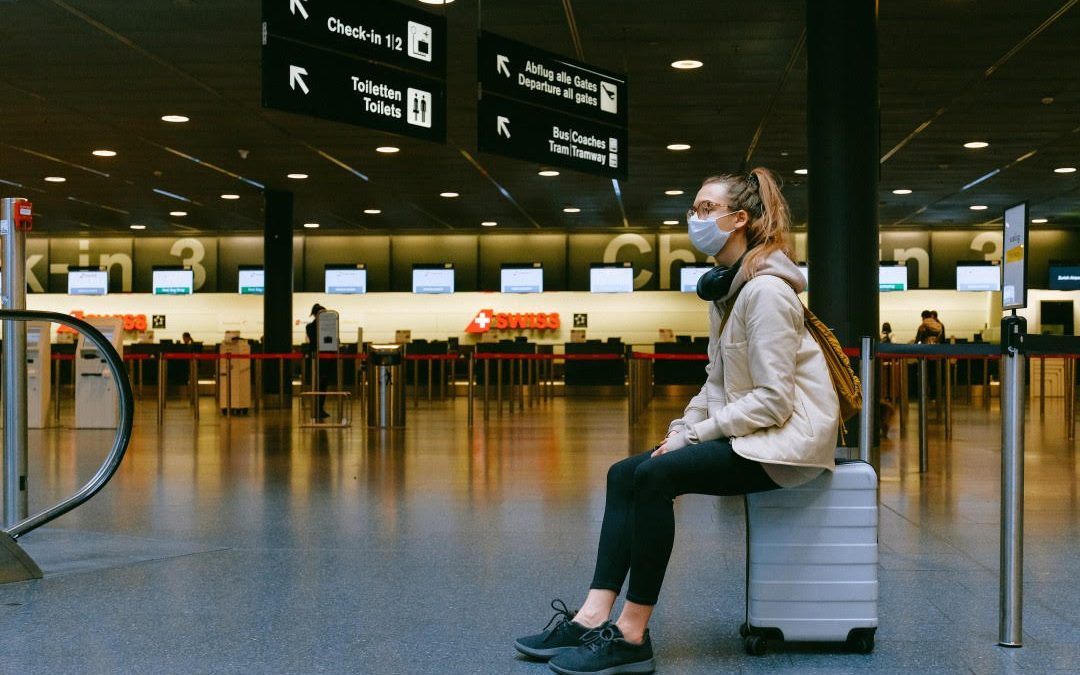 Woman Waiting At Airport