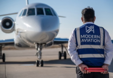 Modern Aviation Fbo Denver Employee And Plane